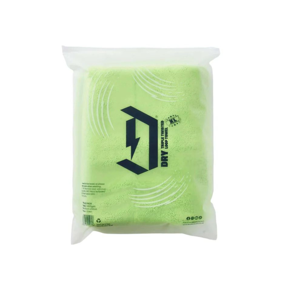 Green triple twisted loop towel in packaging with DRY logo and text.