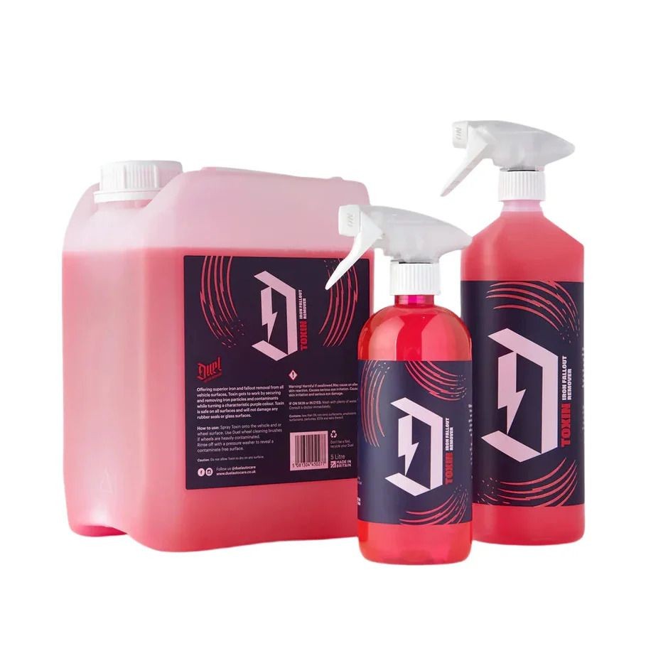 Three bottles of red car cleaning product with black and pink labels.